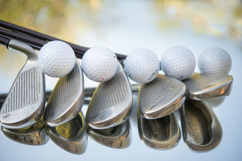 Golf clubs and golf balls laid out, representing the range of grip options available to golfers