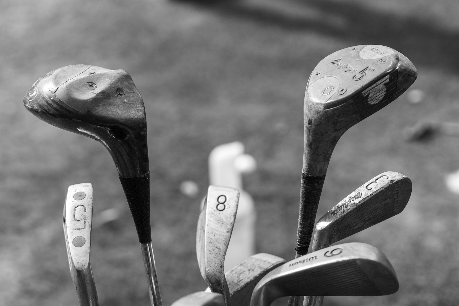 a set of golf clubs arranged in a golf bag