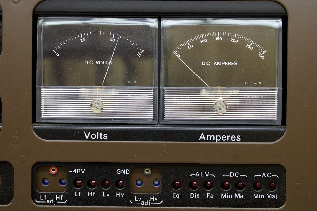 A panel meter showing DC volts and DC amperes, the two readings that matter in a sag test